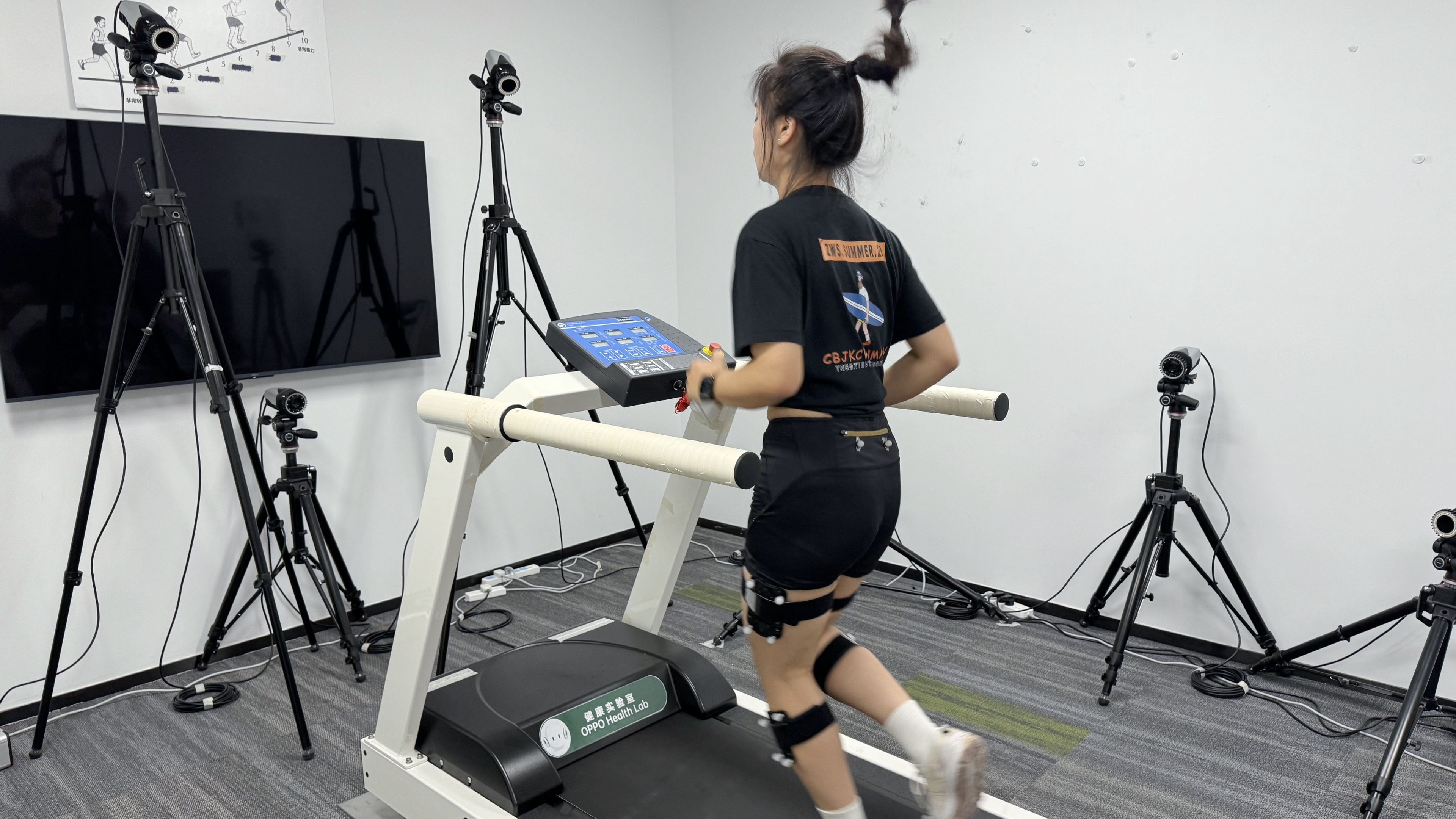 A runner has sensors in her legs to measure her throw, position, cadence and much more information collected by cameras and sensors.